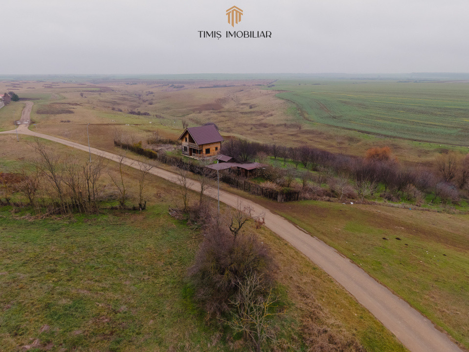 Teren Ianova 1200 mp, vatra satului | asfalt, utilitati | Comision 0%